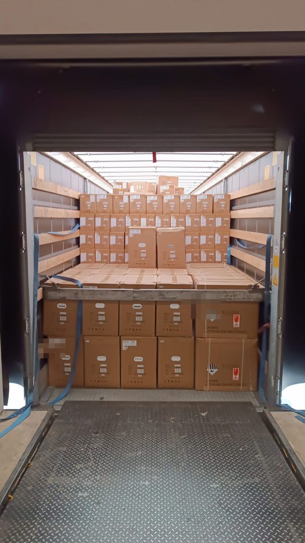 Mixed-SKU order at the loading dock